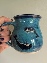 Playful Dolphin Mug